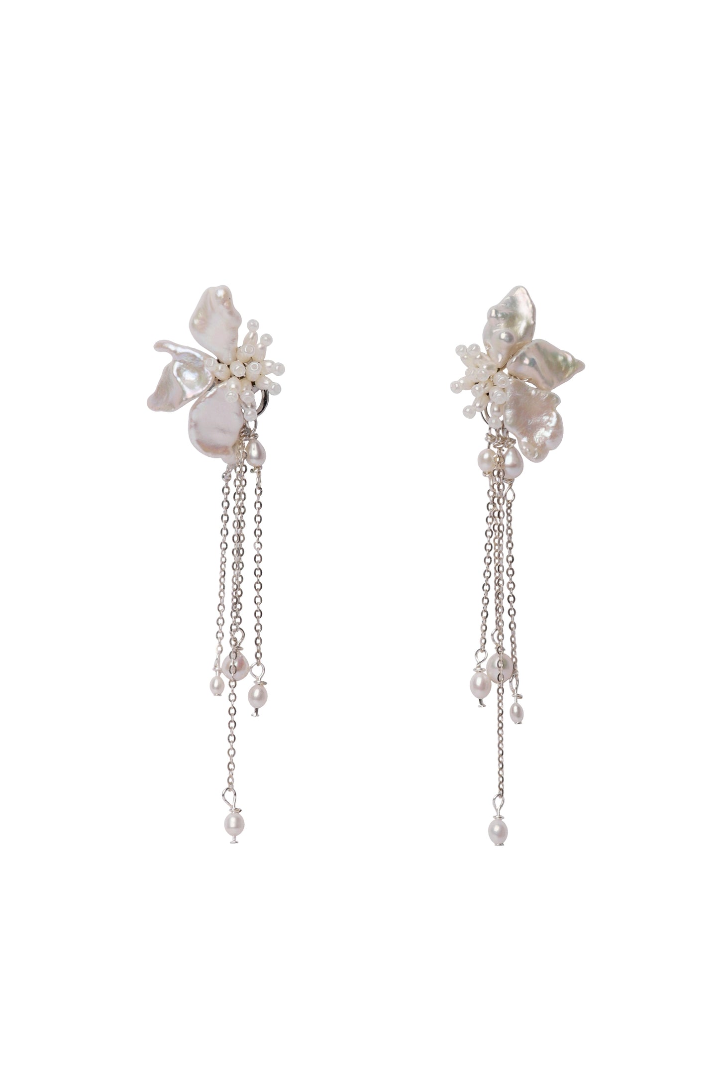 Pair of floral earrings with chain details on a white background