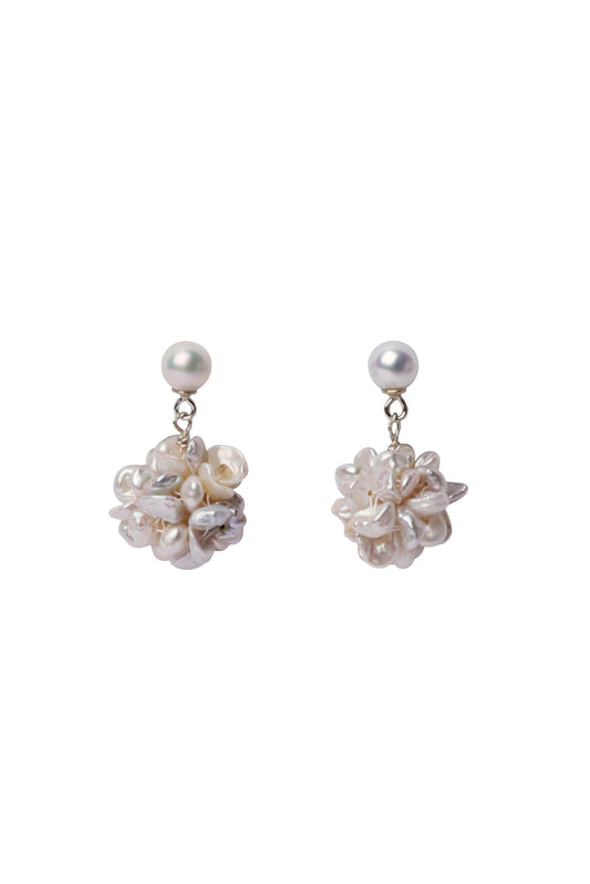 Akoya luster earrings in a white background 