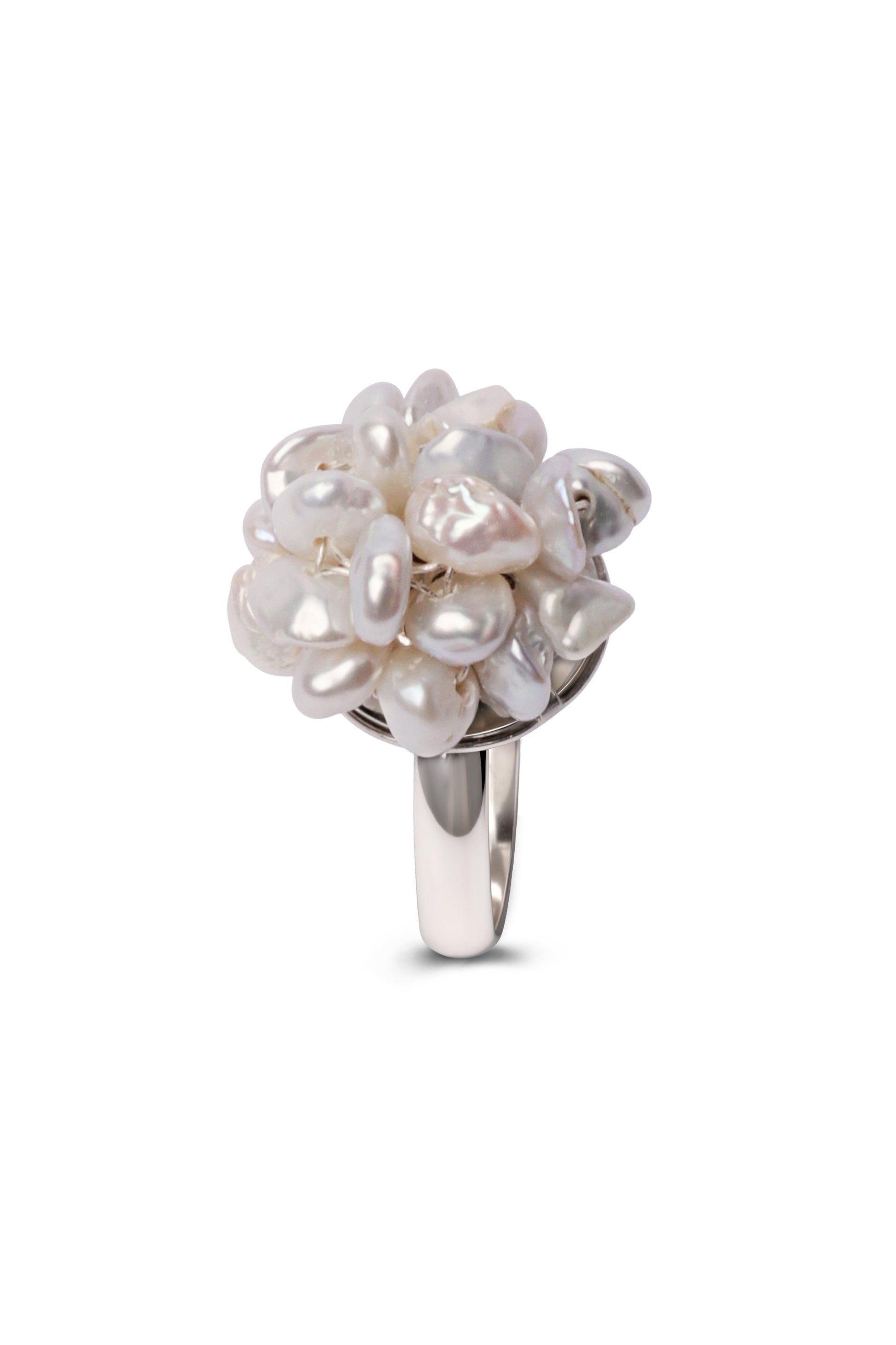 Silver ring with a cluster of pearls on a white background