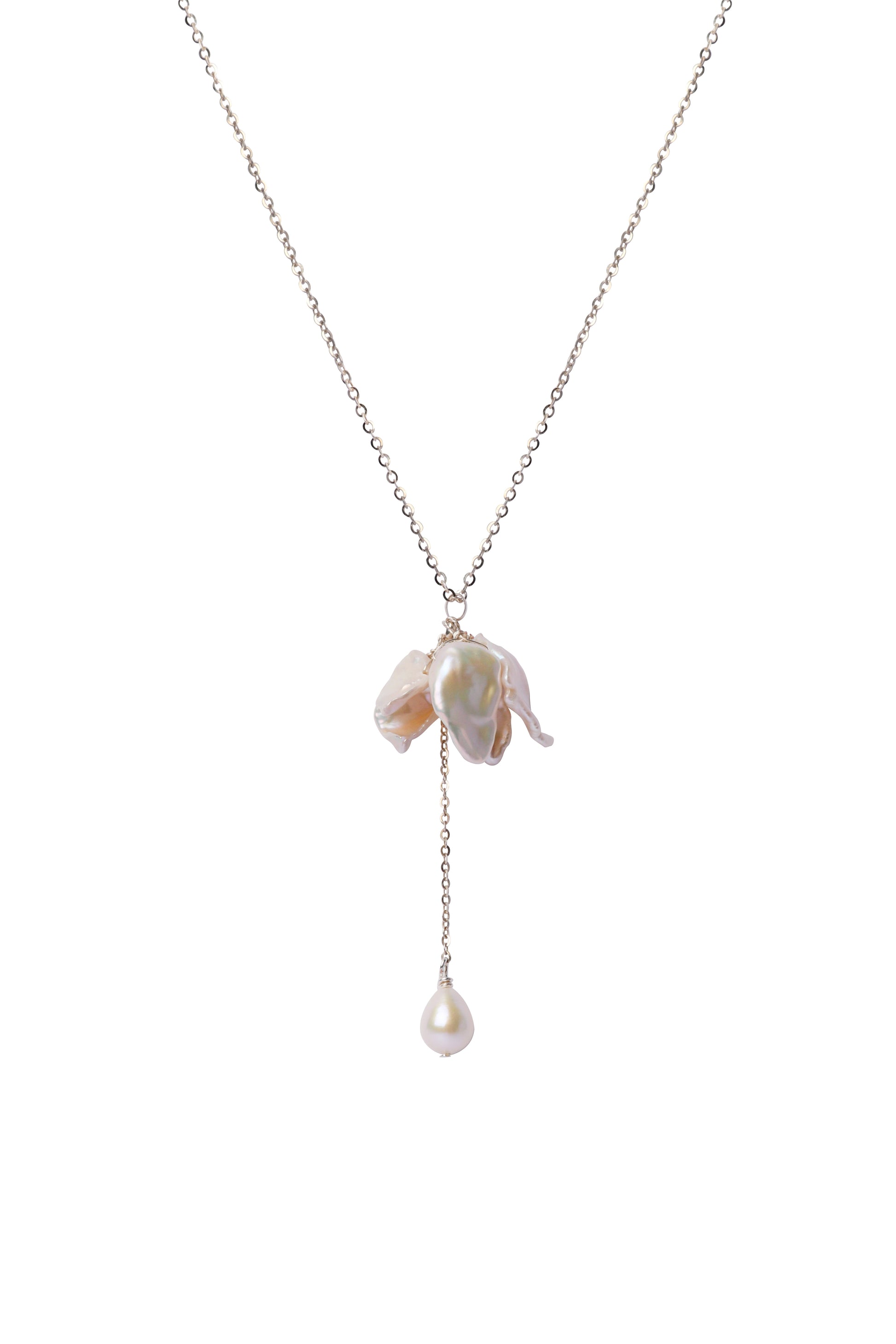 Necklace with a floral pendant and pearl drop on a white background